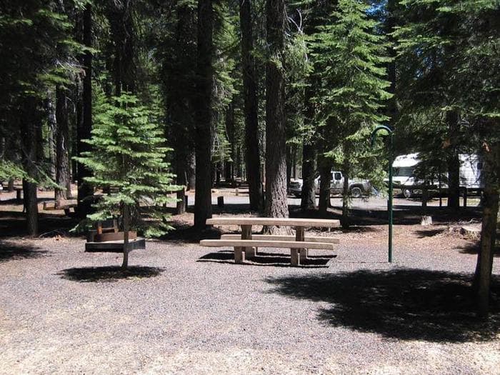 Accessible site at Horse Camp, featuring concrete table, fire ring and grill, and lantern post