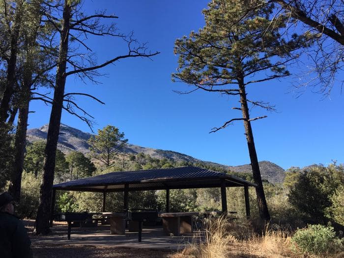Mountain backdrop to a covered ramada