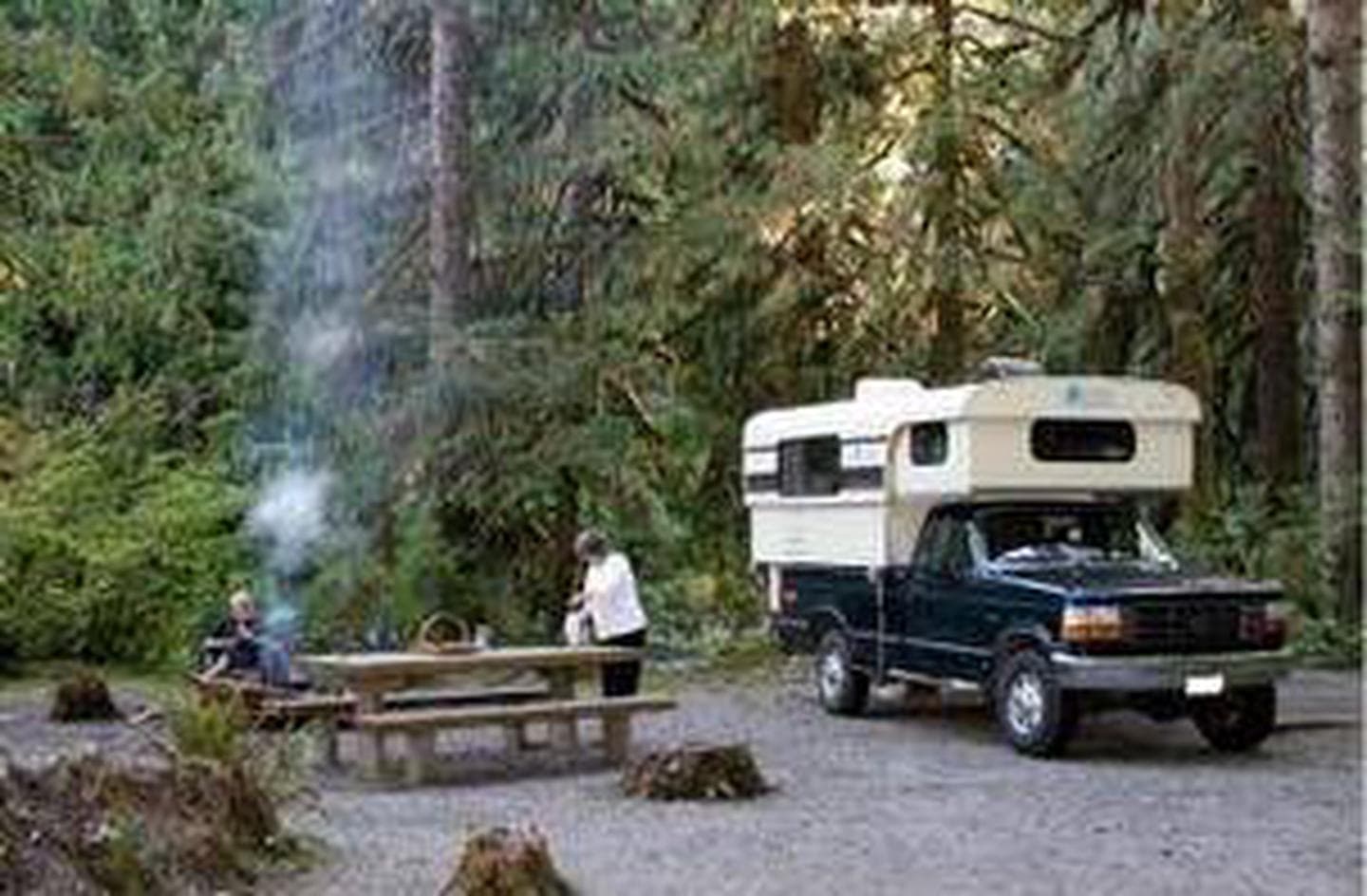Turlo campsite with picnic table and camper