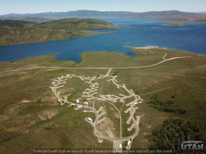 Drone photo of a developed campground near a lake