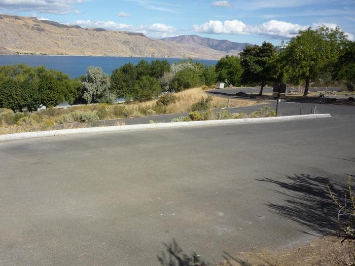 Spring Canyon overlooking groupsite. Trees and lake in the distance.