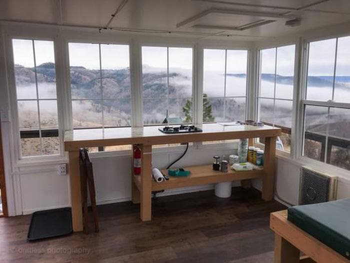 Bench and stove in lookout.