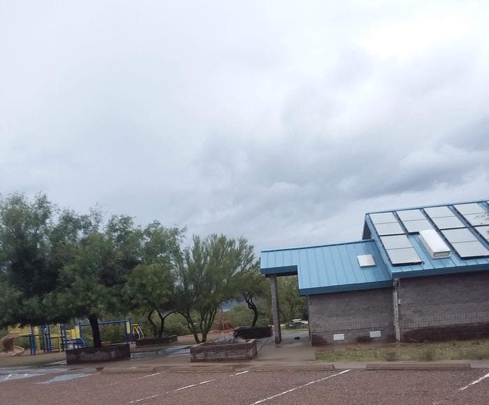 Grapevine site restroom building, and playground