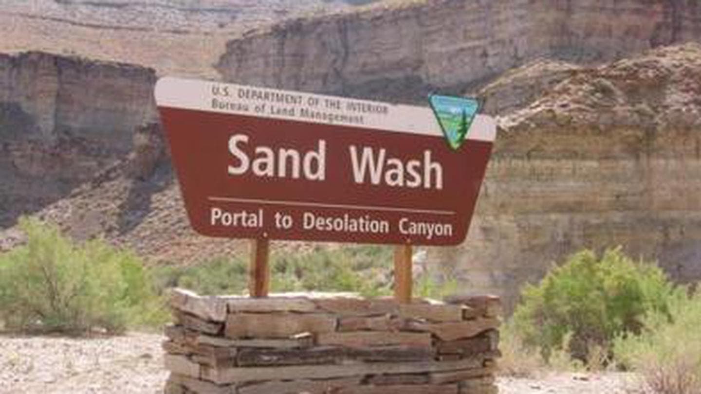 Bureau of Land Management brown portal sign for Sand Wash Portal to Desolation Canyon