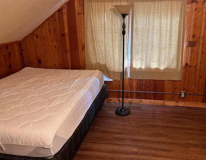 Sollers upstairs smaller bedroom with one bed